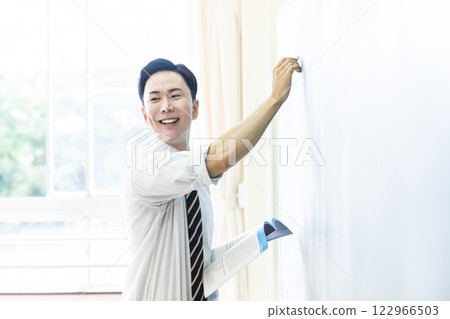 Teacher, teacher, lesson, blackboard, smiling, male 122966503