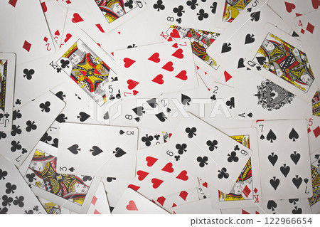 Randomly scattered playing cards 122966654