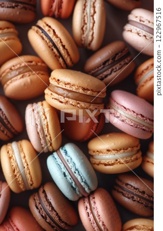 a photo of an abundance of dessert macarons in a studio setting 122967516