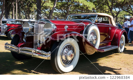 A vintage car show featuring historic classic cars 122968384