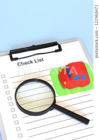Car inspection (car appraisal, car maintenance image, vertical composition) Car inspection (car appraisal, car maintenance image, vertical composition) 122968471