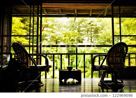 Scenery of a cafe surrounded by greenery Scenery of a cafe surrounded by greenery 122969096