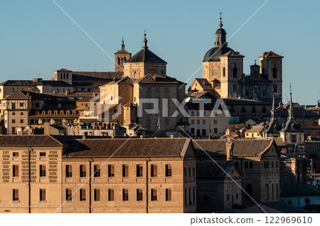 Scenic view of Toledo, Spain, featuring its ancient architecture, historic skyline, and cultural landmarks. Scenic view of Toledo, Spain, featuring its ancient architecture, historic skyline, and cultural landmarks. 122969610