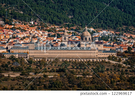 Majestic Royal Monastery of El Escorial stands proudly amidst the scenic Spanish landscape. 122969617