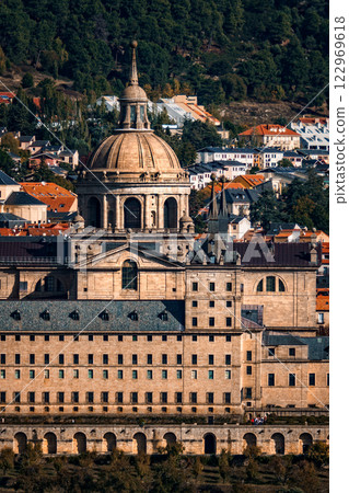 Majestic Royal Monastery of El Escorial stands proudly amidst the scenic Spanish landscape. 122969618