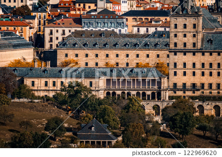 Majestic Royal Monastery of El Escorial stands proudly amidst the scenic Spanish landscape. 122969620