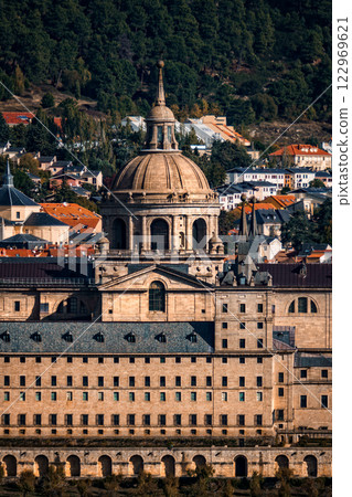 Majestic Royal Monastery of El Escorial stands proudly amidst the scenic Spanish landscape. 122969621