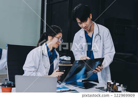 Implement those changes and we can see. Shot of a group of nurses and doctors having a meeting together. Implement those changes and we can see. Shot of a group of nurses and doctors having a meeting together. 122969909