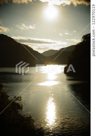 Lake stained in sunset Lake stained in sunset 122970119