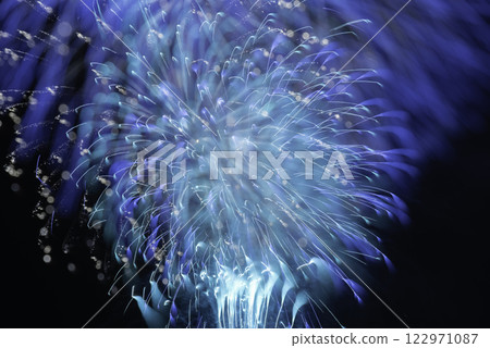 Radiating fireworks shot with focus out Radiating fireworks shot with focus out 122971087
