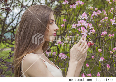 Lovely spring lady. Beautiful woman outdoors portrait Lovely spring lady. Beautiful woman outdoors portrait 122971328