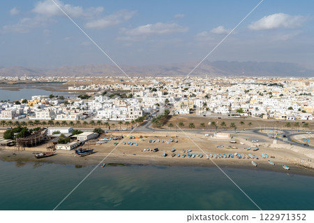 The beach and beautiful cityscape of Sur, the port city of Oman 122971352