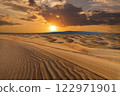 Sunset over the sand dunes in the desert. Sahara desert 122971901
