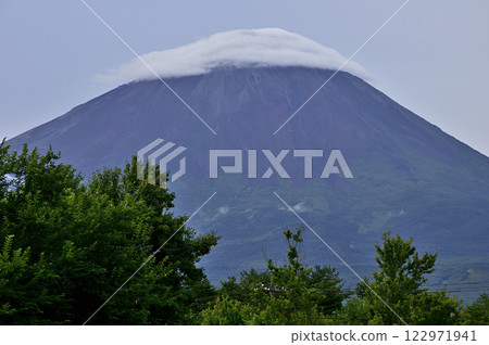 Mount Fuji covered in clouds in summer as seen from Neba in Fujikawaguchiko Town, Yamanashi Prefecture 122971941