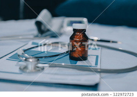 stethoscope on a report stethoscope on a clipboard stethoscope on a book stethoscope on a report stethoscope on a clipboard stethoscope on a book 122972723