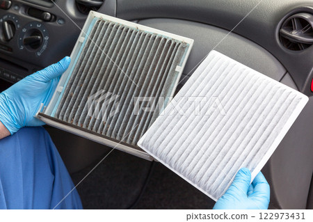 Dirty and clean cabin pollen air filter for a car 122973431