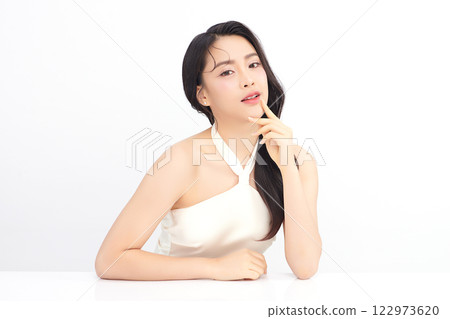 Beautiful young asian woman with clean fresh skin on white background, Face care, Facial treatment, Cosmetology, beauty and spa, Asian women portrait. 122973620