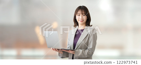 Woman with a laptop / business woman Woman with a laptop / business woman 122973741