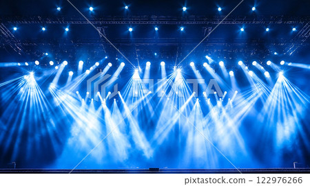 Spotlight shining stage background Spotlight shining stage background 122976266