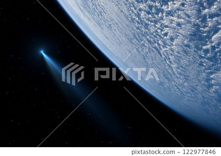 Comet flying near to planet Earth. Falling comet. 122977846