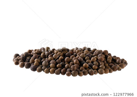 Pile allspice or Jamaican pepper isolated on white background. Pile allspice or Jamaican pepper isolated on white background. 122977966