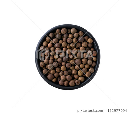 black ceramic bowl with allspice or Jamaican pepper isolated on white background, top view. 122977994