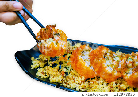 Top view of Salmon rolls, Delicious sushi with fish fillet, focus selective Top view of Salmon rolls, Delicious sushi with fish fillet, focus selective 122978839