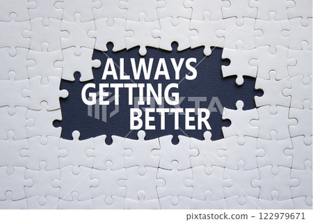 Always getting better symbol. White puzzle with words Always getting better. Beautiful deep blue background. Business and Always getting better concept. Copy space. 122979671