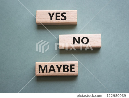 Yes No Maybe symbol. Concept words Yes No Maybe on wooden blocks. Beautiful grey green background. Business and Yes No Maybe concept. Copy space. Yes No Maybe symbol. Concept words Yes No Maybe on wooden blocks. Beautiful grey green background. Business and Yes No Maybe concept. Copy space. 122980089