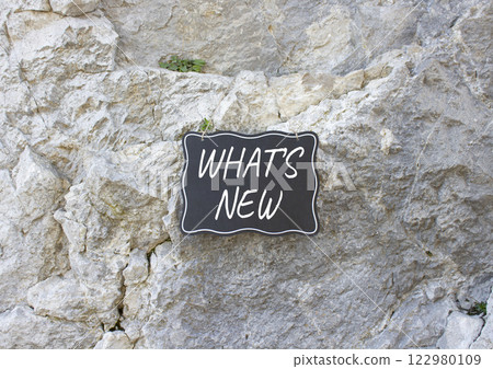 What is new symbol. Stone wall with words What is new. Beautiful stone background. Business and What is new concept. Copy space. 122980109