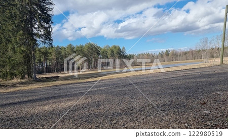 Sunny day, machony sky, aswalt. 122980519