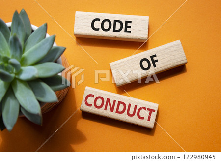 Code of conduct symbol. Wooden blocks with words Code of conduct. Beautiful orange background with succulent plant. Business and Code of conduct concept. Copy space. Code of conduct symbol. Wooden blocks with words Code of conduct. Beautiful orange background with succulent plant. Business and Code of conduct concept. Copy space. 122980945