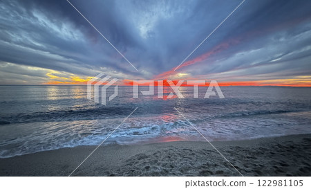 Sunset ocean sky Dusky swirling sky. High quality photo 122981105