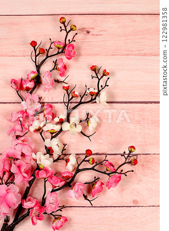 Still life with beautiful blooming sakura branches, Spring abstract flower arrangement. Greeting card for mother's day, women's day, happy birthday, wedding, gift for loved ones 122981358