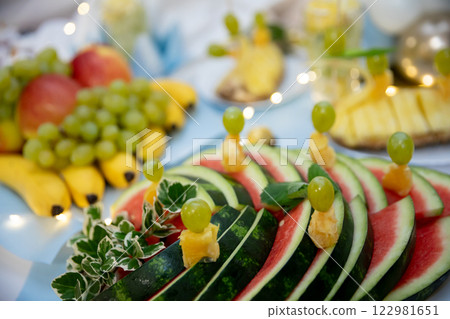 A Refreshing and Colorful Fruit Display Featuring Watermelon Alongside Assorted Fresh Fruits 122981651