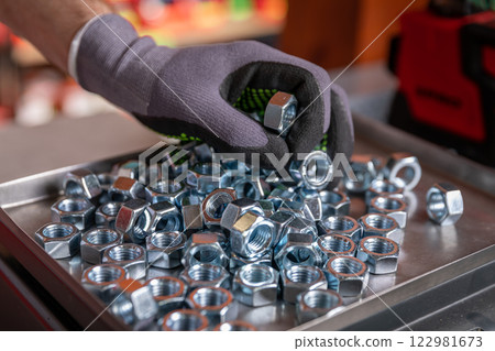 Properly Hand Handling Metal Fasteners in a Workshop Environment is Essential for Safety Properly Hand Handling Metal Fasteners in a Workshop Environment is Essential for Safety 122981673