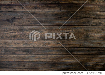 A Beautiful Textured Dark Wooden Surface Ideal for Inspiring Creative Backgrounds 122982791