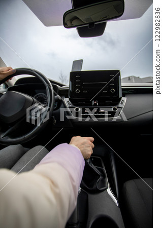 A Contemporary Vehicle Interior Featuring the Drivers Viewpoint and Infotainment Technology 122982836