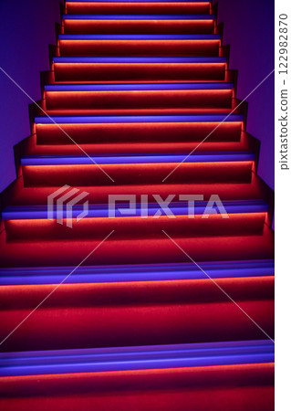A Stunning and Colorful Staircase Featuring EyesCatching Vibrant Red and Blue Lighting 122982870