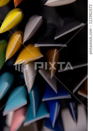 An assortment of Colorful Stationery Supplies that feature Pointed Ends for creative use 122982872