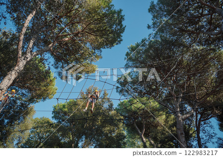Child in forest adventure park Child in forest adventure park 122983217