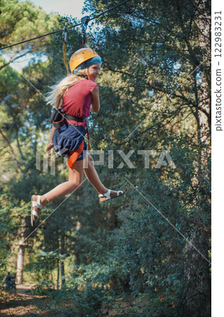 Child in forest adventure park Child in forest adventure park 122983231