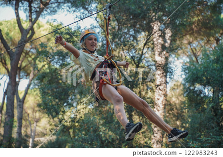 Child in forest adventure park 122983243