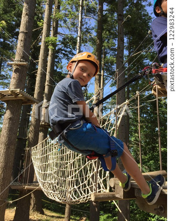 Child in forest adventure park Child in forest adventure park 122983244