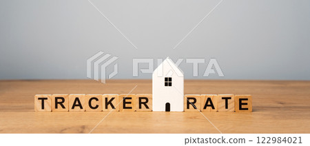 Wooden blocks with word Tracker rate. Type of variable interest rate on a loan or mortgage that follows an external benchmark as the central bank's base interest rate. Real estate concept 122984021