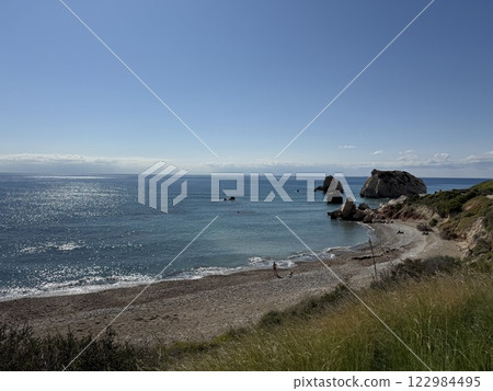 Scenic beach and rock formations in Cyprus. Mediterranean Sea, road, travel, view of mountains and sea. 122984495