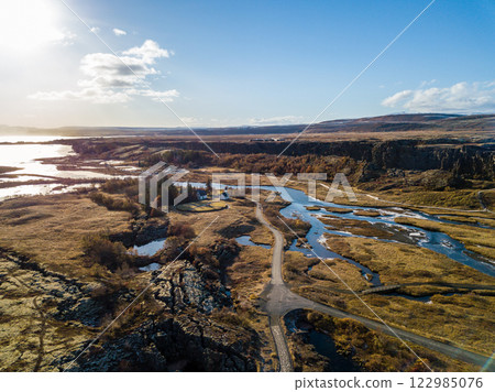 Aerial views reveal the breathtaking scenery of Tingvellir national park in Iceland, showcasing its remarkable natural beauty and unique geological features Aerial views reveal the breathtaking scenery of Tingvellir national park in Iceland, showcasing its remarkable natural beauty and unique geological features 122985076