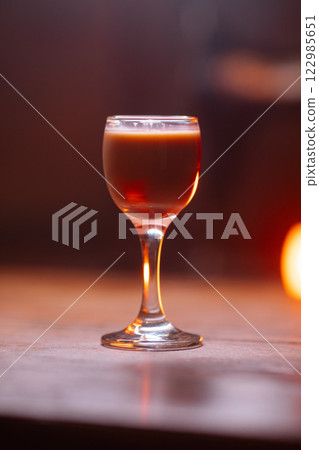 A beautiful bright cocktail. Restaurant. Delicious A beautiful bright cocktail. Restaurant. Delicious 122985651