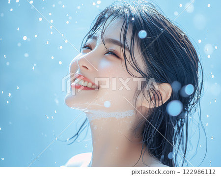 Image of a woman with soap bubbles 122986112