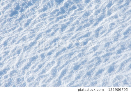 Beautiful snow surface patterns [Snowy landscape image] 122986795